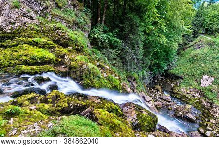 View Of Giessbach Waterfall At Brienzersee Lake In Switzerland