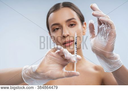 Relaxed Woman Preparing For A Beauty Injection