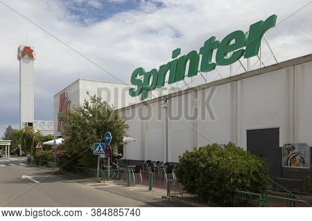 Zaragoza, Spain - August 18, 2020: Area Of Shopping Centers And Huge Hypermarkets And Stores On The 