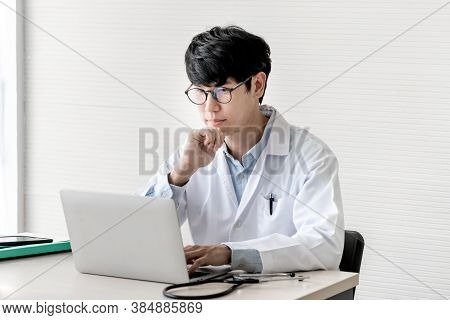 The Doctor Is Using A Notebook Computer, In Search Of Information And Write A Report About The Patie