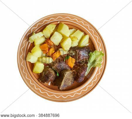 Boodog - Mongolian Cuisine Dish Of Barbecued Goat Or Tarbagan Marmot Cooked With Heated Stones Inser