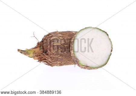 Group Of Sweet Taro Root Isolated On White Background Arbi Or Aravi Roots With One Cut In Cross Sect