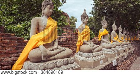 Ayutthaya, Thailand - June 29, 2019: A Row Of Buddhas At Buddhist Temple Wat Yai Chai Mongkhon (wat 