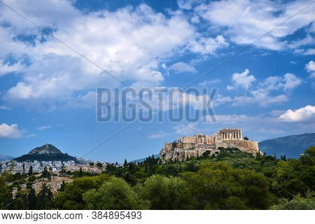 Iconic View Of Acropolis Hill And Lycabettus Hill In Background In Athens, Greece From Pnyx Hill In 