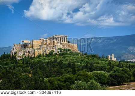 Great View Of Acropolis Hill From Pnyx Hill On Summer Day With Great Clouds In Blue Sky, Athens, Gre