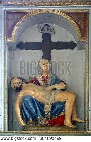 PETROVINA, CROATIA - JULY 22, 2013: Altar of Our Lady of Sorrows in the Parish Church of Saint Peter in Petrovina, Croatia
