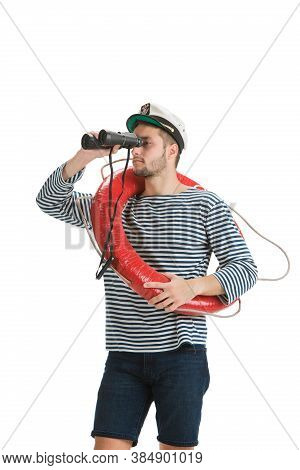 Holding Lifeline And Binocular. Caucasian Male Sailor In Uniform On White Background. Young Man Usin