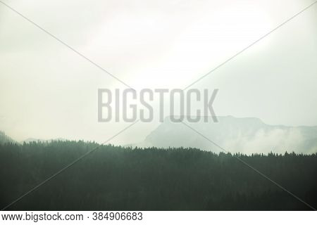 Gloomy And Frightening Mountains In The Fog