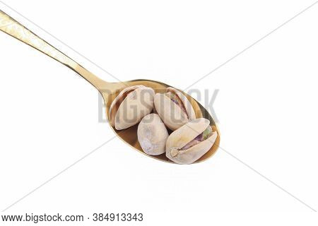 Pistachios In White Porcelain Bowls. Roasted Pistachio Seeds In Shells And Shelled. Green, Dried Fru