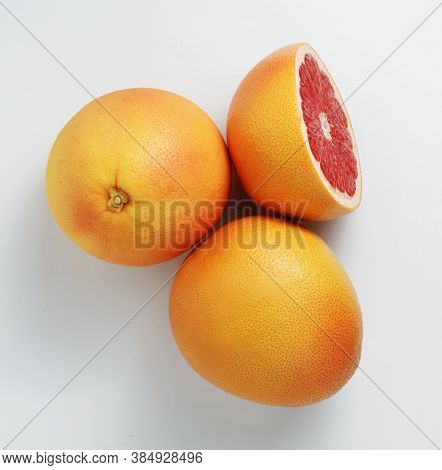 Fresh Red Grapefruits. Slice. Isolate On A White Background. Top View