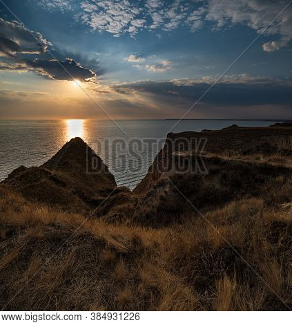 Picturesque Sunset Landscape Of Stanislav Clay Mountains And Canyons Above Dnipro River Bay Near The