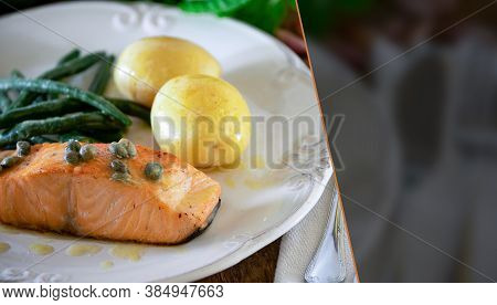 Grilled Salmon Fillet With Caper Sauce, Potatoes, Garlic, Parsley And Green Beans. Selective Focus.