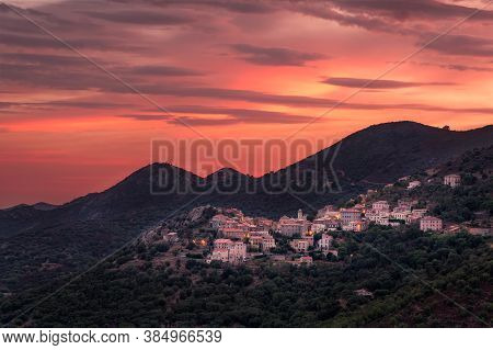 Dawn Breaking Over The Mountain Village Of Belgodere In The Balagne Region Of Corsica