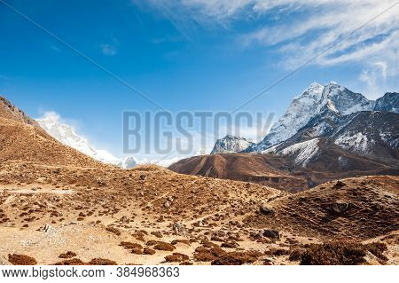 Valley Leading To The Everest Base Camp With Cholatse And Taboche Peak. Trekking In Nepal Himalayas.