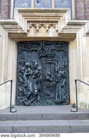 Kevelaer, Germany - Sept 5, 2020: Nice Relief On The Metal Door From The Basilica Church