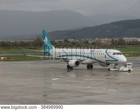 Florence, Italy - Circa November 2019: Airdolomiti Embraer Erj-195lr During Taxi At Peretola Airport