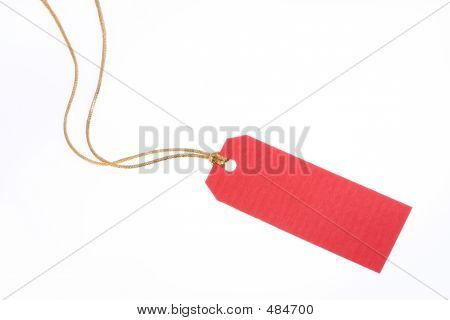 황금 밧줄으로 빨간색 선물 태그