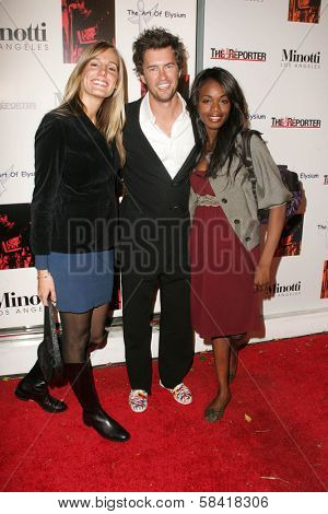 LOS ANGELES - DECEMBER 02: Crystal Fambrini with Blake Mycoskie and Nzinga Blake at the 