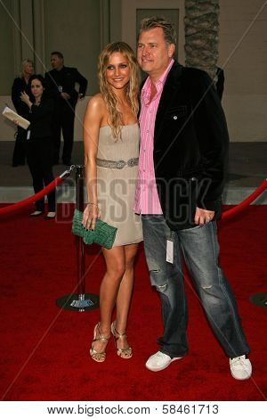 LOS ANGELES - NOVEMBER 21: Ashlee Simpson and Joe Simpson at the 34th Annual American Music Awards at Shrine Auditorium November 21, 2006 in Los Angeles, CA