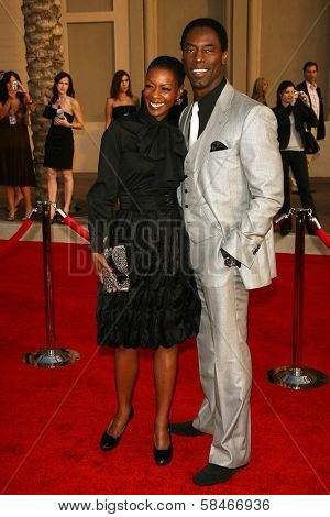 LOS ANGELES - NOVEMBER 21: Isaiah Washington and wife Jenisa at the 34th Annual American Music Awards at Shrine Auditorium November 21, 2006 in Los Angeles, CA