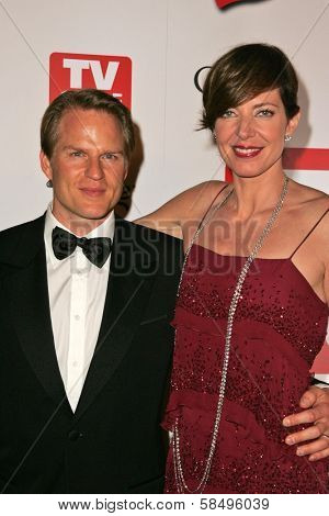 HOLLYWOOD - AUGUST 27: Allison Janney and Richard Jenik at the TV Guide Emmy After Party at Social August 27, 2006 in Hollywood, CA.