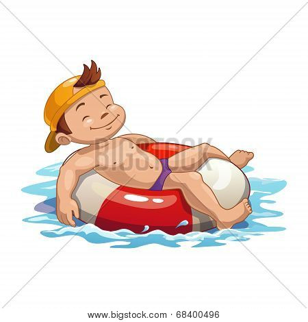 Boy is swimming on the pool ring