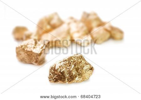 Gold Nuggets On White Background.