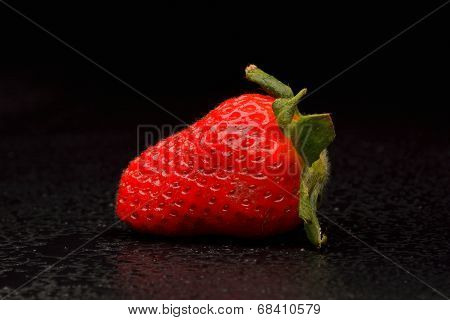 Frech Strawberries With Leaves On Black Background