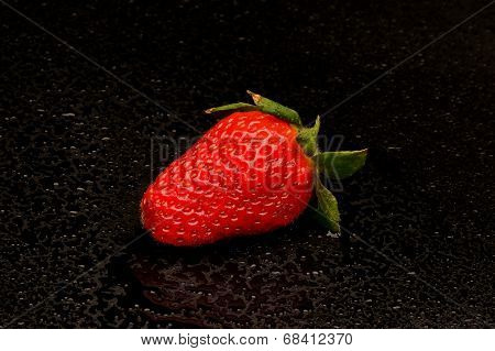 Frech Strawberries With Leaves On Black Background