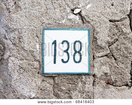 Number 138 On Old Wall