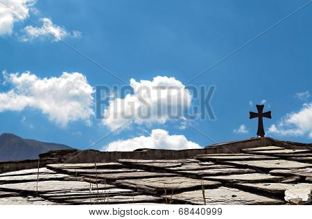 Christian Cross On A Roof