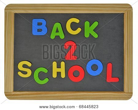 Back to school written on childs slate