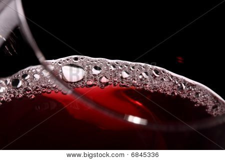 close up of red wine glass