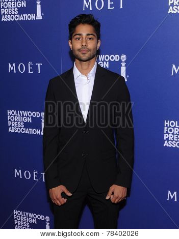 LOS ANGELES - AUG 14:  Manish Dayal arrives to the HFPA Annual Installation Dinner 2014 on August 14, 2014 in Beverly Hills, CA                