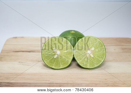 Green  lemon, cut in half