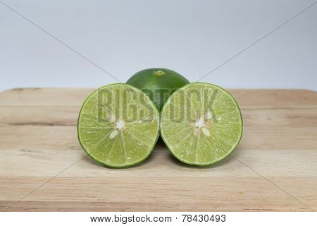 Green  lemon, cut in half