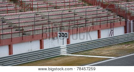 300 limit signal and empy grandstand