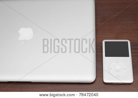 Ipod Classic 160 Gb On Silver Macbook. Studio Shot.