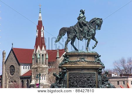 Bronze Rider's Monument And St. Franics Xavier Church On The Background In Philadelphia