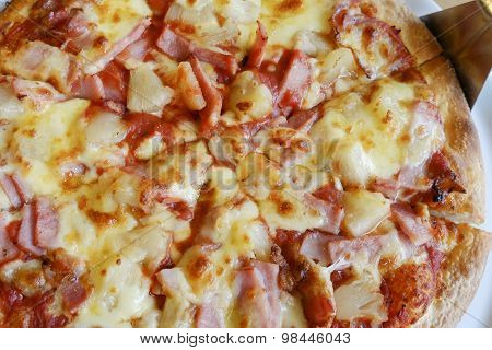 Delicious Hawaiian Rustic Style Pizza Made With Fresh Pineapples,ham And Mozzarella Cheese