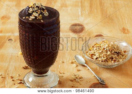 Acai Frozen Pulp Juice In Glass With Muesli