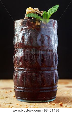 Acai Frozen Pulp Juice In Glass With Muesli