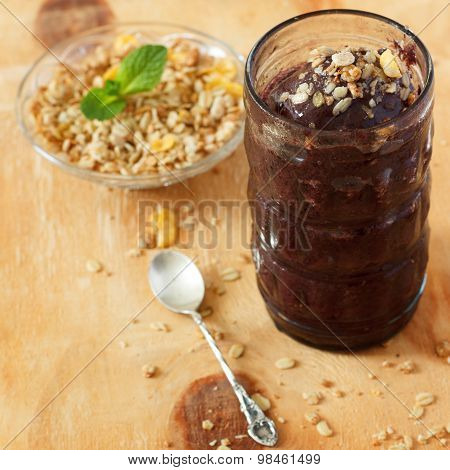 Acai Frozen Pulp Juice In Glass With Muesli