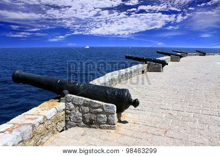 Row Of Old Cannons Aiming At The Sea On The Fortress, Hydra Island, Greece