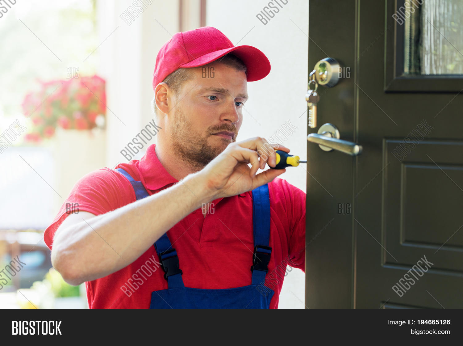 Locksmith Red Uniform Image & Photo (Free Trial) | Bigstock