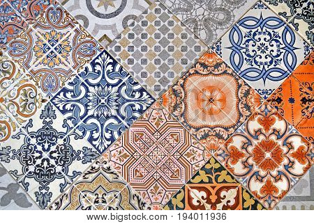 Detail of ornamental ceramic tile with colorful patchwork. Abstract background in oriental style