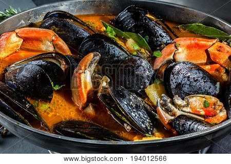 Seafood Mussels Crabs Soup In Metal Pot