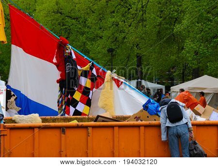 AMSTERDAM, NETHERLANDS - APRIL 30. The Dutch national colours on display at Queensday in Amsterdam. Queensday is a popular annual festival celebrating the Queens Birthday.
