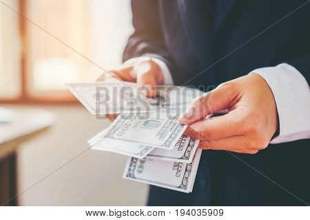 Business Man Hands Counting Us Dollar Bills  Saving Concept