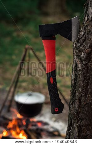 Hiking pot in the bonfire. Traveling in the mountains with tents.
